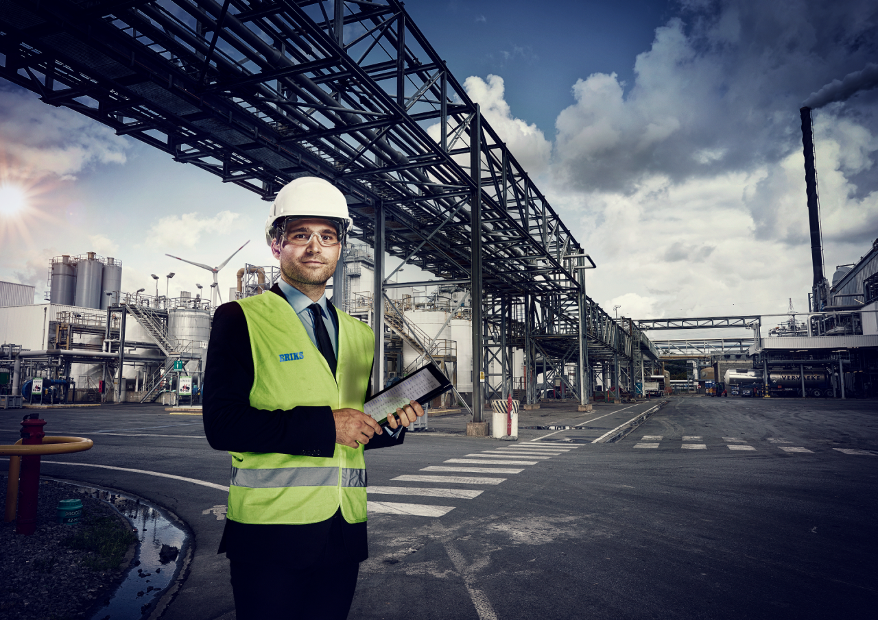 ERIKS employee standing in front of chemical plant in Belgium